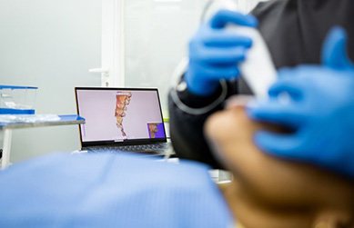 Dentist using a digital impression system