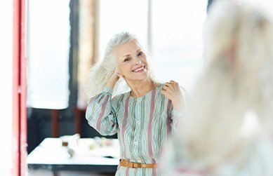 Woman checking her fit in the mirror