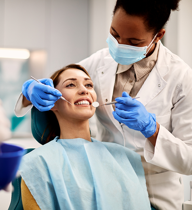 Woman getting a dental exam