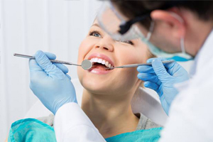 Woman receiving dental exam