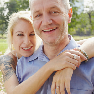 couple posing in the park