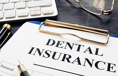 Dental insurance form on a clipboard