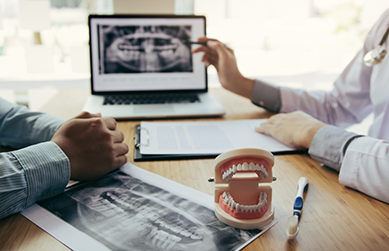 Man at a dental implant consultation