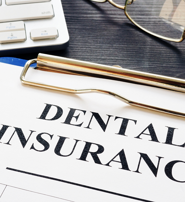 Dental insurance form on a clipboard