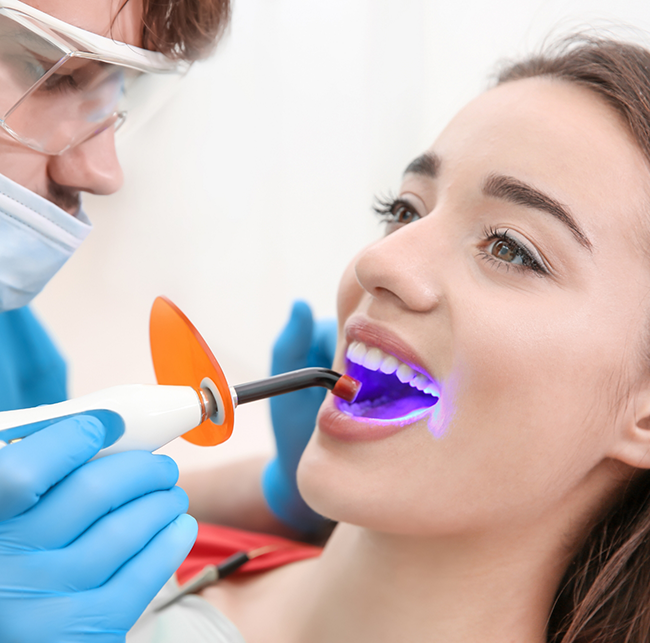 Woman getting dental sealants in Sparks