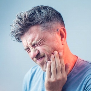 a man with mouth pain