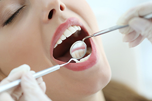 woman at appointment for gum disease treatment in Sparks