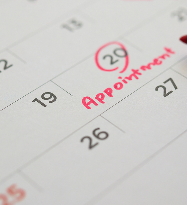 Date of a dental appointment circled on a calendar