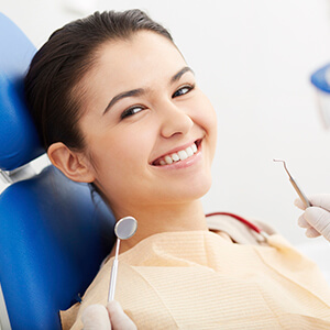 Sparks Preventive Dentistry patient smiling in dental chair