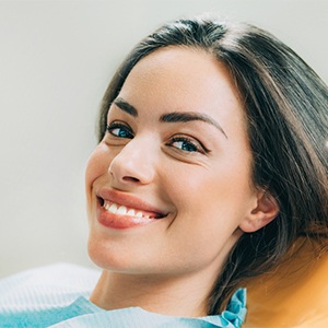 woman in dental chair for gum disease treatment in Sparks