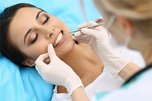 woman in dental chair having a deep cleaning