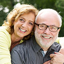 Older couple with healthy smiles