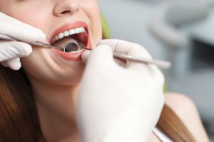 woman in dental chair smiling