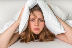 woman tired pillow
