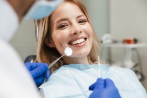 Smiling woman with a dentist