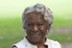 woman smiling with dental implants