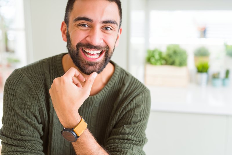 young man smiling and laughing