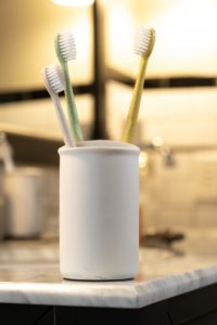 Toothbrush holder on bathroom counter