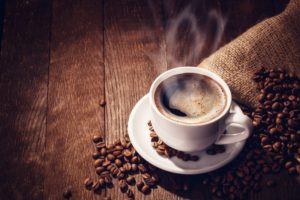 closeup of cup of coffee that affects dental health