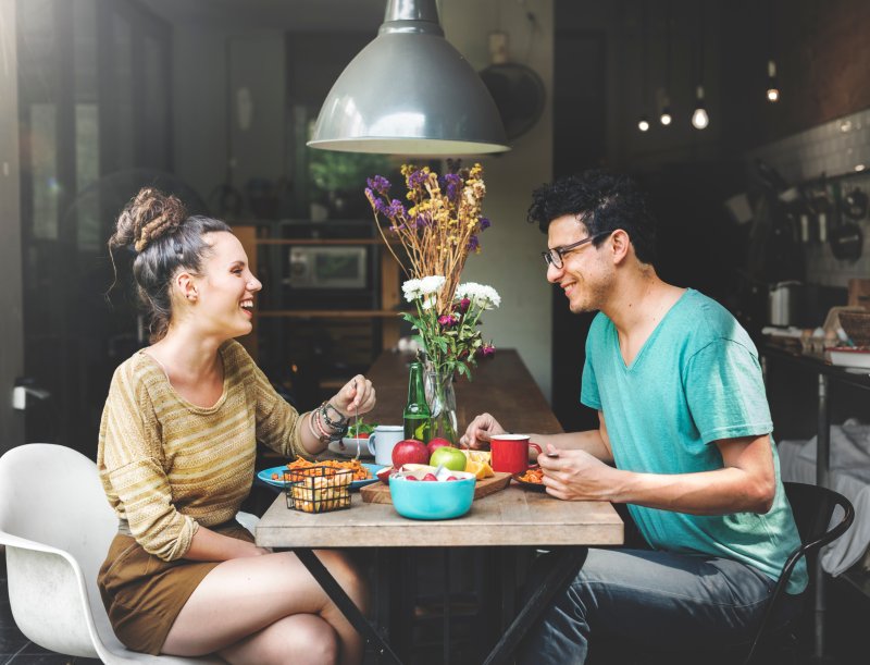 a couple smiling and laughing during a date