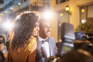 Stars with dental implants smiling